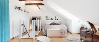 White sloping ceiling in an attic room